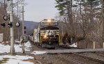 NS 4679 leads eastbound manifest freight across Route 100 in Macungie